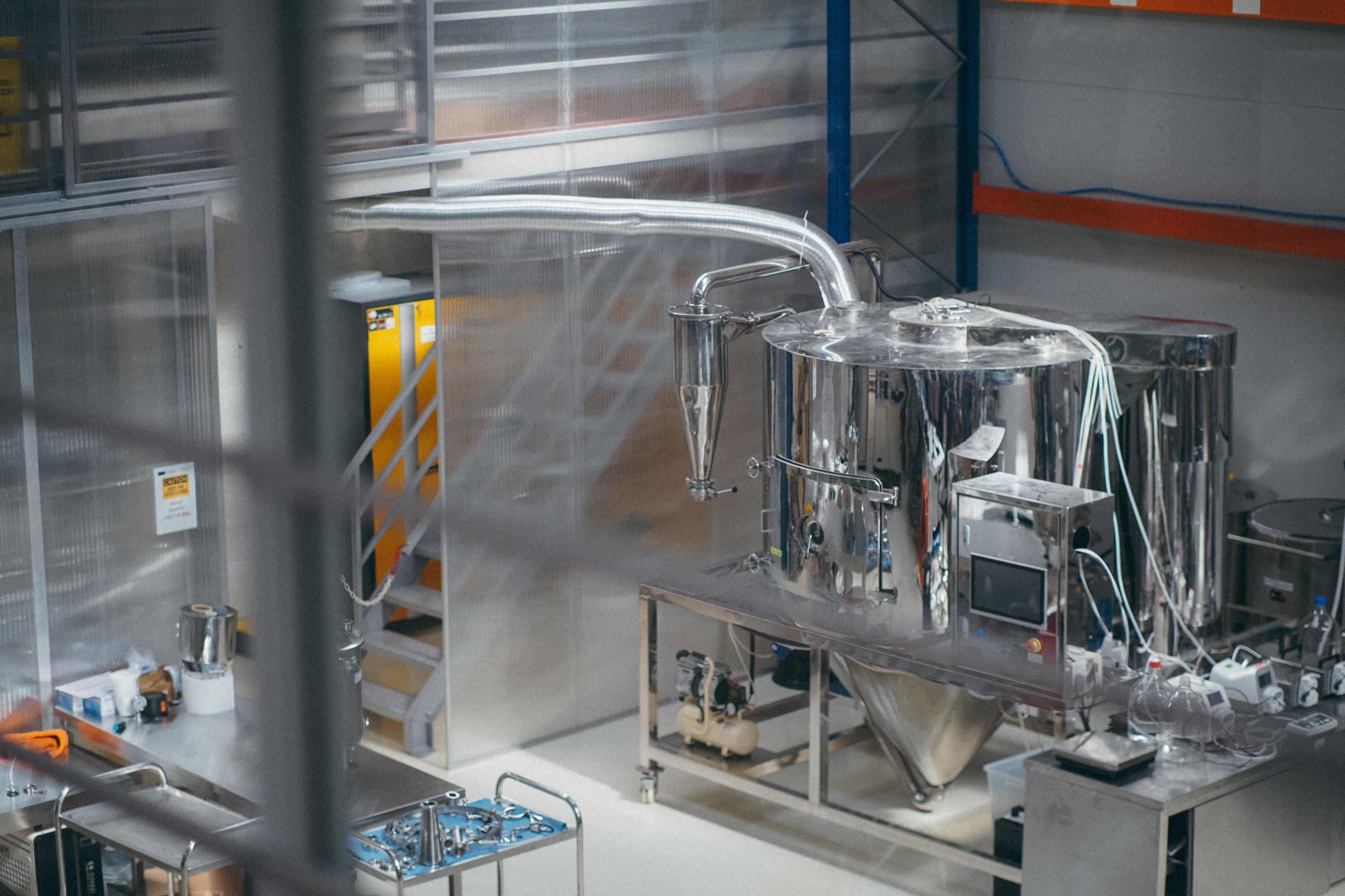 The drying plant: a vessel, its cyclone separator and the stairs running up behind it.